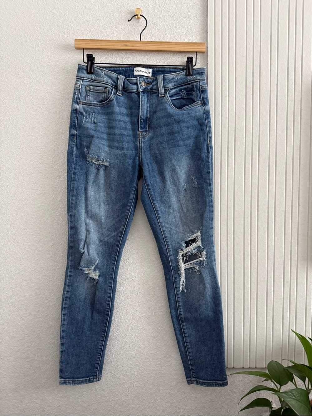Studio Blue Light Wash Distressed Skinny Jeans